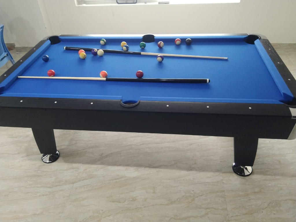 Pool table recreation area at VStay